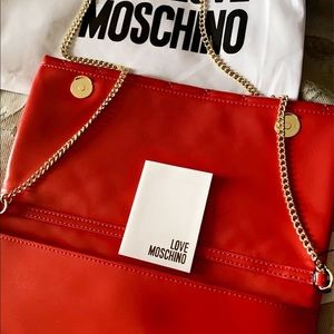 cross shoulder bag, new. never used .long gold chain.